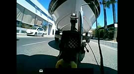 Boat trailer tow hitch failure on public road narrowly missing other vehicles