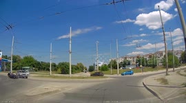 Moped Rider Almost Falls Under the Wheels of a Car