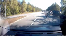 Accident: Minivan Carrying a Boat Crashes Into Sign at Intersection