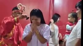 Thai locals walk on burning coal and bathe in boiling oil to celebrate Chinese New Year