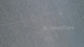 Backwards revealing drone shot in 4K