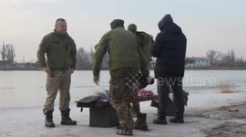 Ukrainian soldiers leave frontline to dive in icy water on Feast of Baptism of Lord