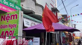 Crowded food market in Vietnam. People preparing for the New Year celebration (TET)