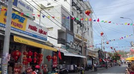 Crowded food market in Vietnam. People preparing for the New Year celebration (TET)