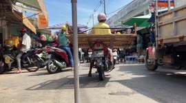 Crowded food market in Vietnam. People preparing for the New Year celebration (TET)