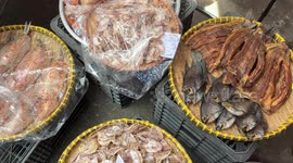 Crowded food market in Vietnam. People preparing for the New Year celebration (TET)