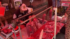 Crowded food market in Vietnam. People preparing for the New Year celebration (TET)