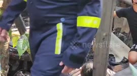 Motorcycle rider winched to safety after falling into thick mud