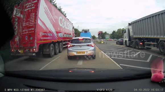 Impatient astra driver undertakes a British Gas van and caused the van to take evasive action to avoid a collision