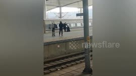 Chinese passenger begs worker to open train door after missing departure time