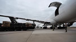 US servicemen load equipment destined for Ukraine