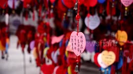 Visitors Hang Good Luck Pendants In Xi'an, China