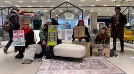 'Warm-Up' protest at John Lewis & Partners in Oxford Street organised by Fuel Poverty Action