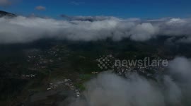 Stunning aerial footage of mist-shrouded Guanxi Village, China