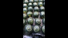 Vietnamese farmer uses lasers to decorate 6,000 watermelons a day for Lunar New Year