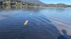 King tide flooding adds to recent Sausalito, California January storm damage on the bikepath
