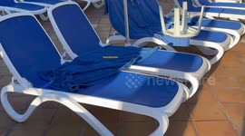 Towels blocking sun beds at a hotel in Tenerife this week left out at 7am by selfish tourists