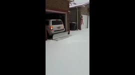 Canadian dad makes home-made plow hitch attachment to clear his driveway of snow (raw)