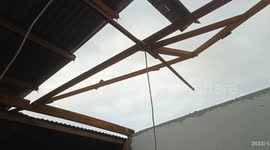 A strong wind hit the city of Padang, and a number of houses were damaged