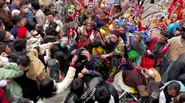 Dancers in costume fight with spectators in China