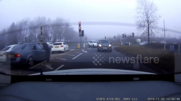 ROAD RAGE CAUGHT ON DASHCAM. Guy rips off someone's windscreen wiper that hits my car and then punches their window!!