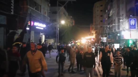Palestinians in Gaza City celebrate after deadly synagogue shooting in Jerusalem