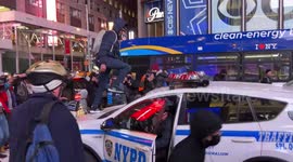 Tyre Nichols protester walks on roof of NYPD car, smashes windshield, and immediately gets arrested