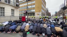 Muslim protests pray outside awedish embassy after right wing man burns quran