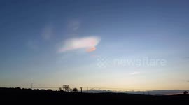 Strange, weird, and beautiful iridescent cloud phenomenon in the Scottish skies right now!