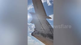 Locals explore abandoned Soviet military plane in Libya