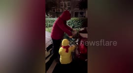 Father collects box of snow for his children to play with in China