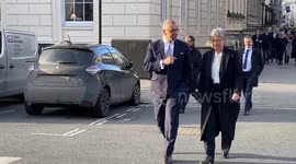 James Cleverly and Penny Wong walking in central London