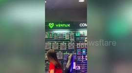 Philippines earthquake rattles electronic gadgets hanging in shop