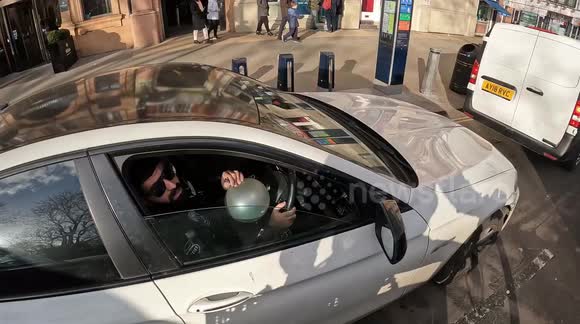 'Reckless': Cyclist catches BMW driver inhaling balloon and throwing rubbish