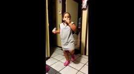 5 year old with using harmonica, bean bag and Crocs to make music