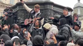 UK Rapper, Digga D, films a music video in Piccadilly Circus with his fans
