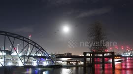A timelapse of the February Full Moon also known as The Snow Moon as it passes by the Thames Cabel Cars over East London