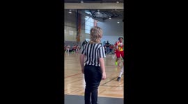 Heartwarming footage shows 7-year-old boy refereeing basketball games