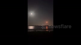 SpaceX launches Hispasat's Amazonas Nexus communications satellite during full moon