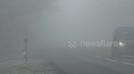 Layer of heavy fog descends on England's pretty Cotswolds on Wednesday morning