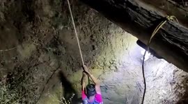 Brave man climbs into well to help rescue trapped calf in central India