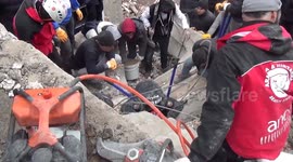 Woman rescued after man shouts into rubble asking for survivors in Turkey