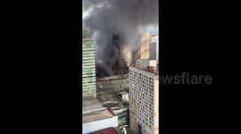 Fire breaks out at bus terminal in Quezon, Philippines