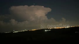 Timelapse footage shows comet flying by during Brazil lightning storm