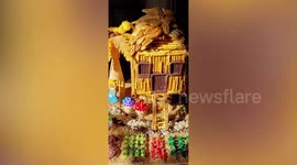 Filipino father makes gingerbread hut to show children traditional bamboo homes