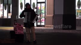 Man Plays Pianica In Front Of Retail Stores In Paducah, KY To Earn Money For His Family