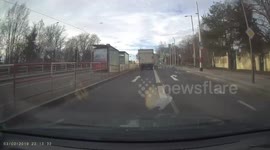 White Audi nearly pulls across our lane in front of driving car in Czech