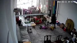 Man drags boy by his feet out of building as earthquake shakes southern China