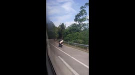 I was on a trip when I saw this cute scenarion of a little dog with his owner in a motor bike.