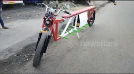 Youth makes an amazing electric with discarded materials that accomodate 10 people